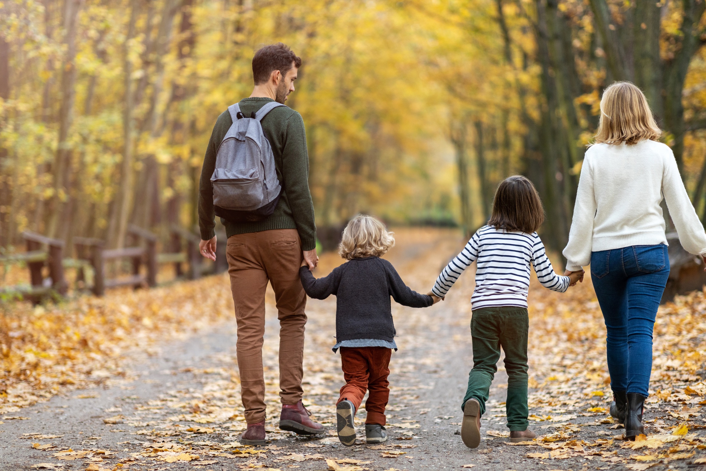 Family walking together towards their future